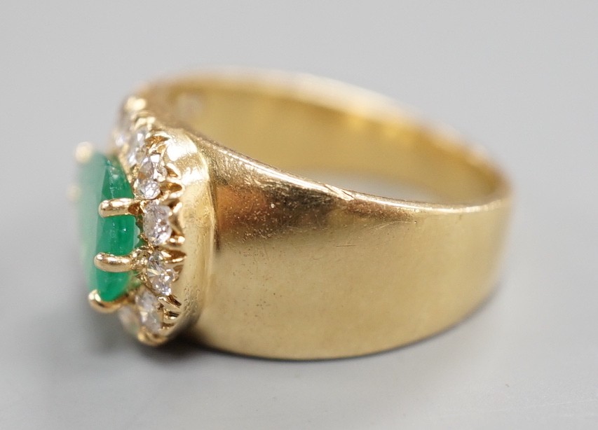 A modern yellow metal, pear cut emerald and diamond cluster set dress ring, size H, gross weight 5.1 grams.